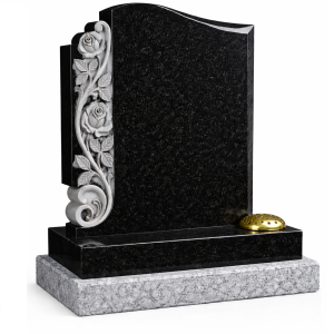 Black headstone with carvings